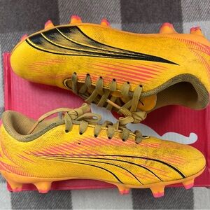 Puma Yellow and Black Soccer Cleats with Pink Highlights